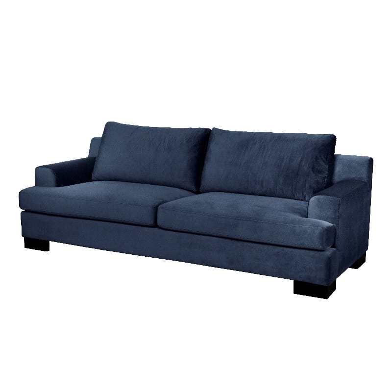 Sofaen "Miami" av Home Factory i stoffet velour, og farge petroleums blå